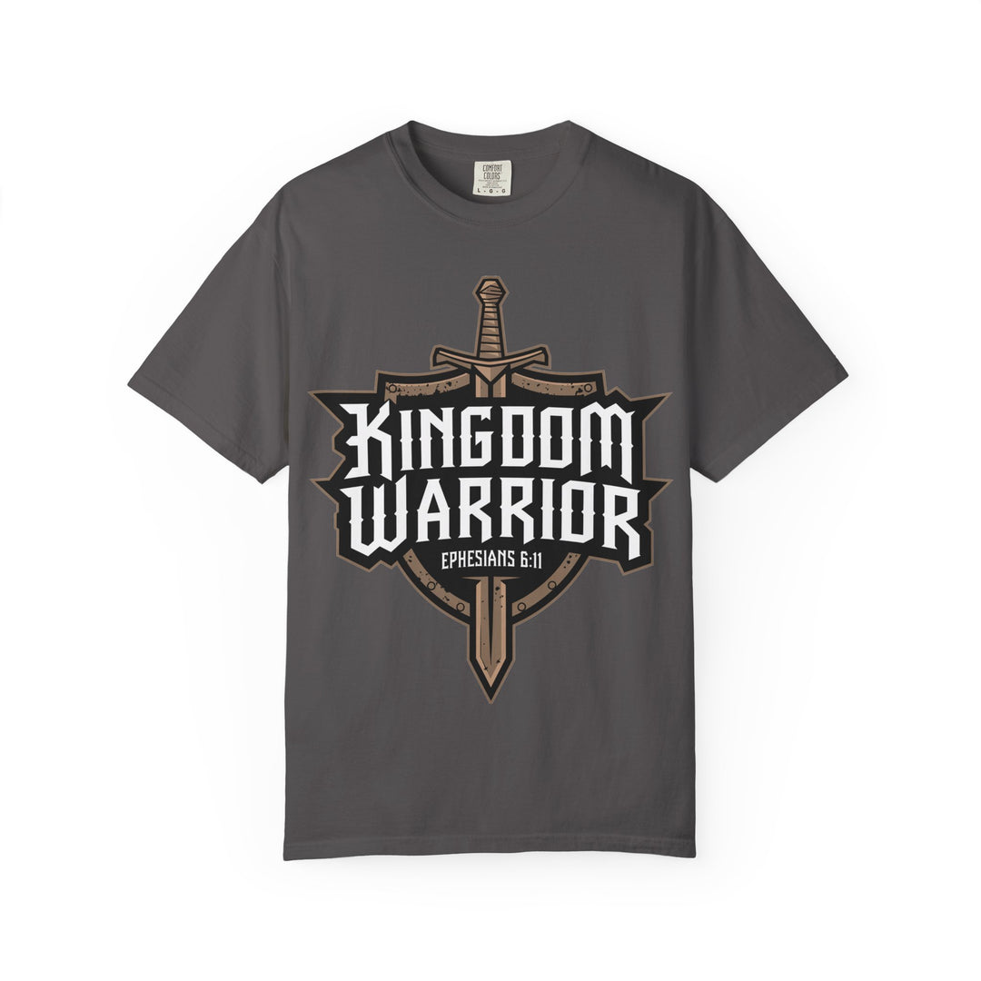 A brown t-shirt with a graphic that includes a shield and a sword, with the text 'Kingdom Warrior' and a Bible verse 'Ephesians 6:11'.